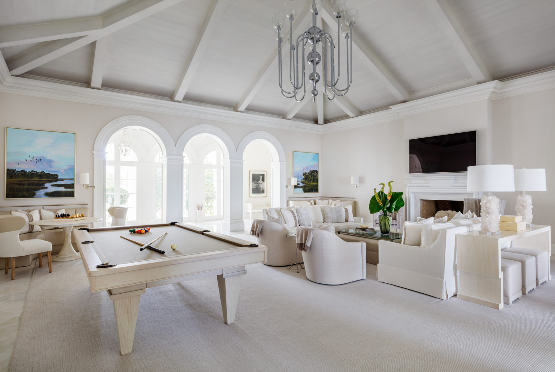 Image of Everglades Isle Waterfront living room with pool table and archways