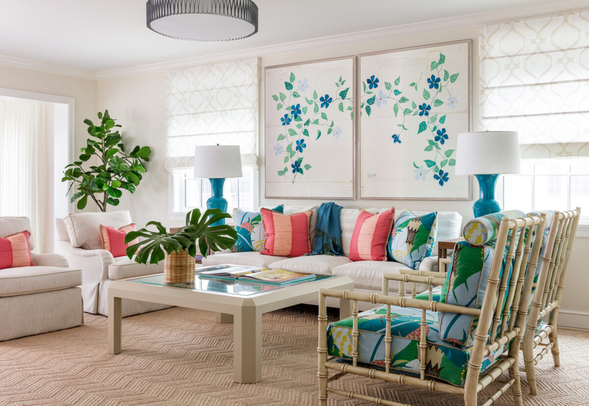 living room with white sofa and multicolor pillows and accents